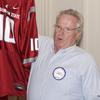 Washington States greatest fan, David DeMeyer, with a prized posession, a WSU jersey.